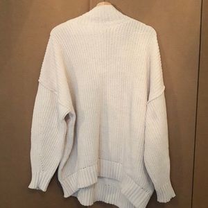 Cream slouchy turtleneck sweater